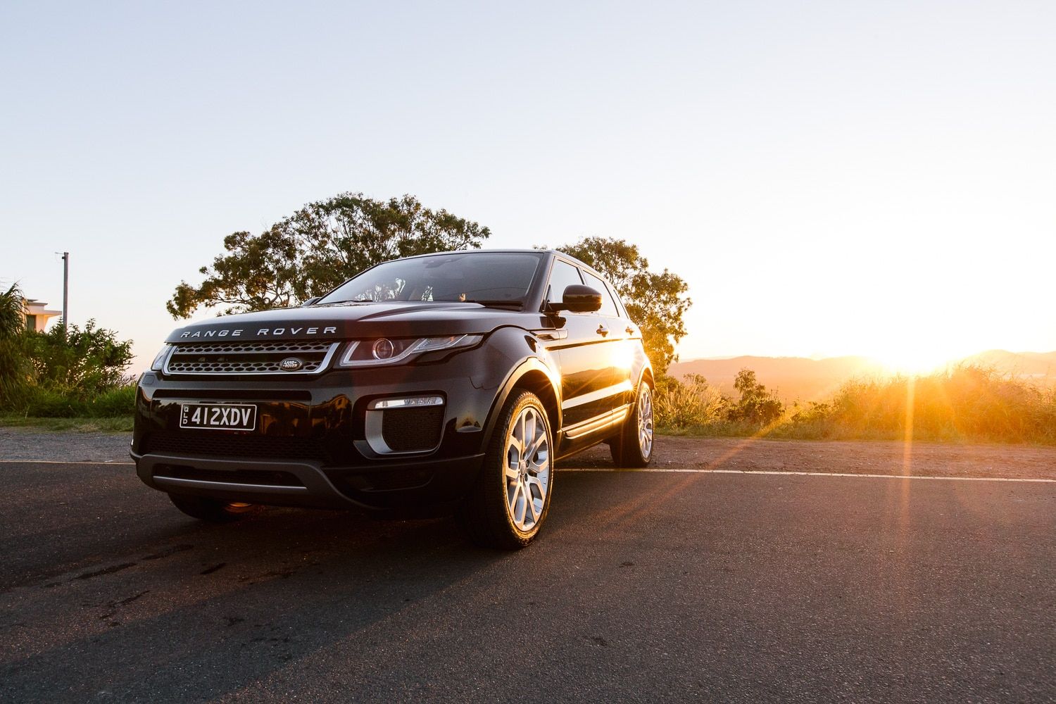 Black Range Rover Evoque, freshly detailed, parked at sunset on the Sunshine Coast