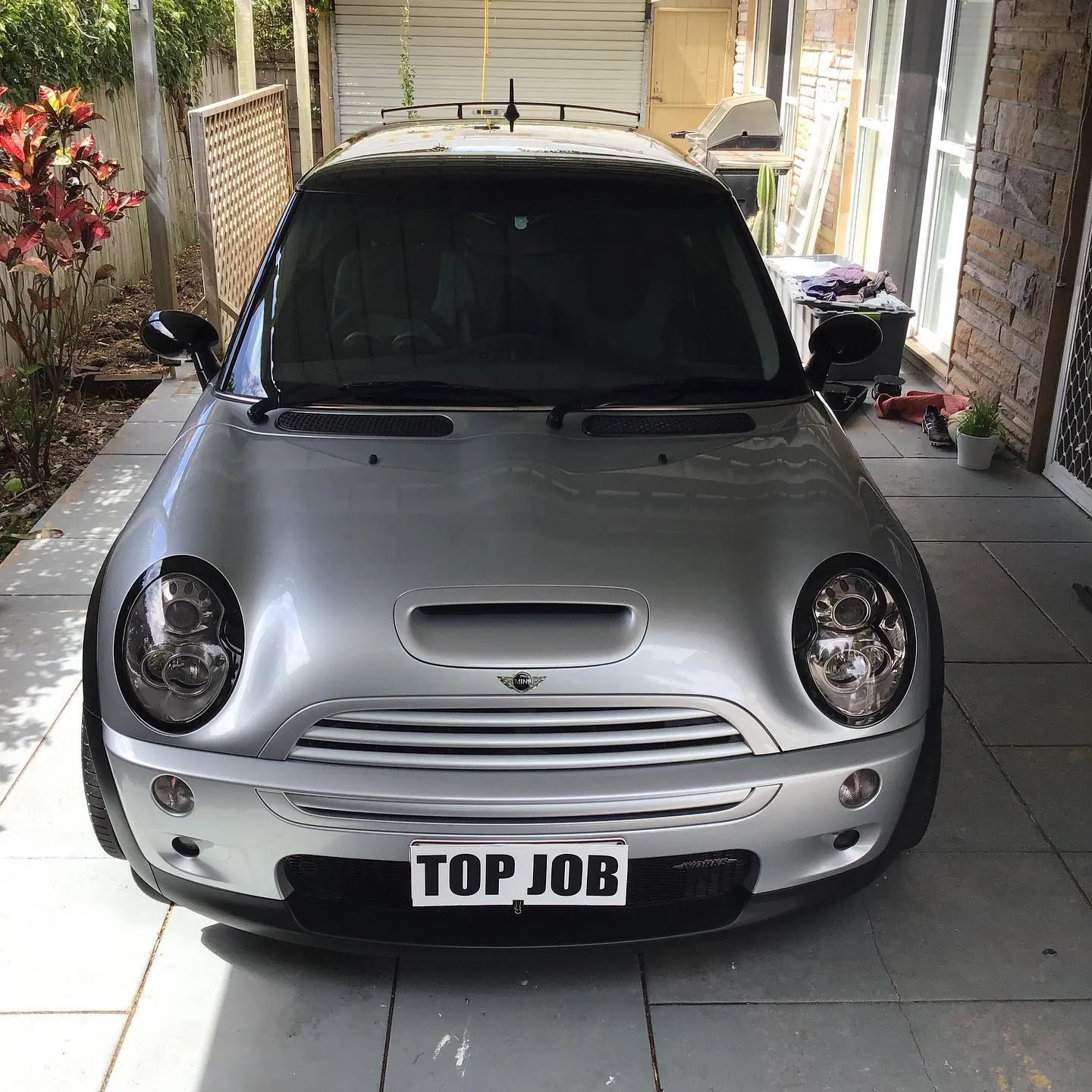 Silver Mini Cooper S after a clay bar decontamination and paint detail