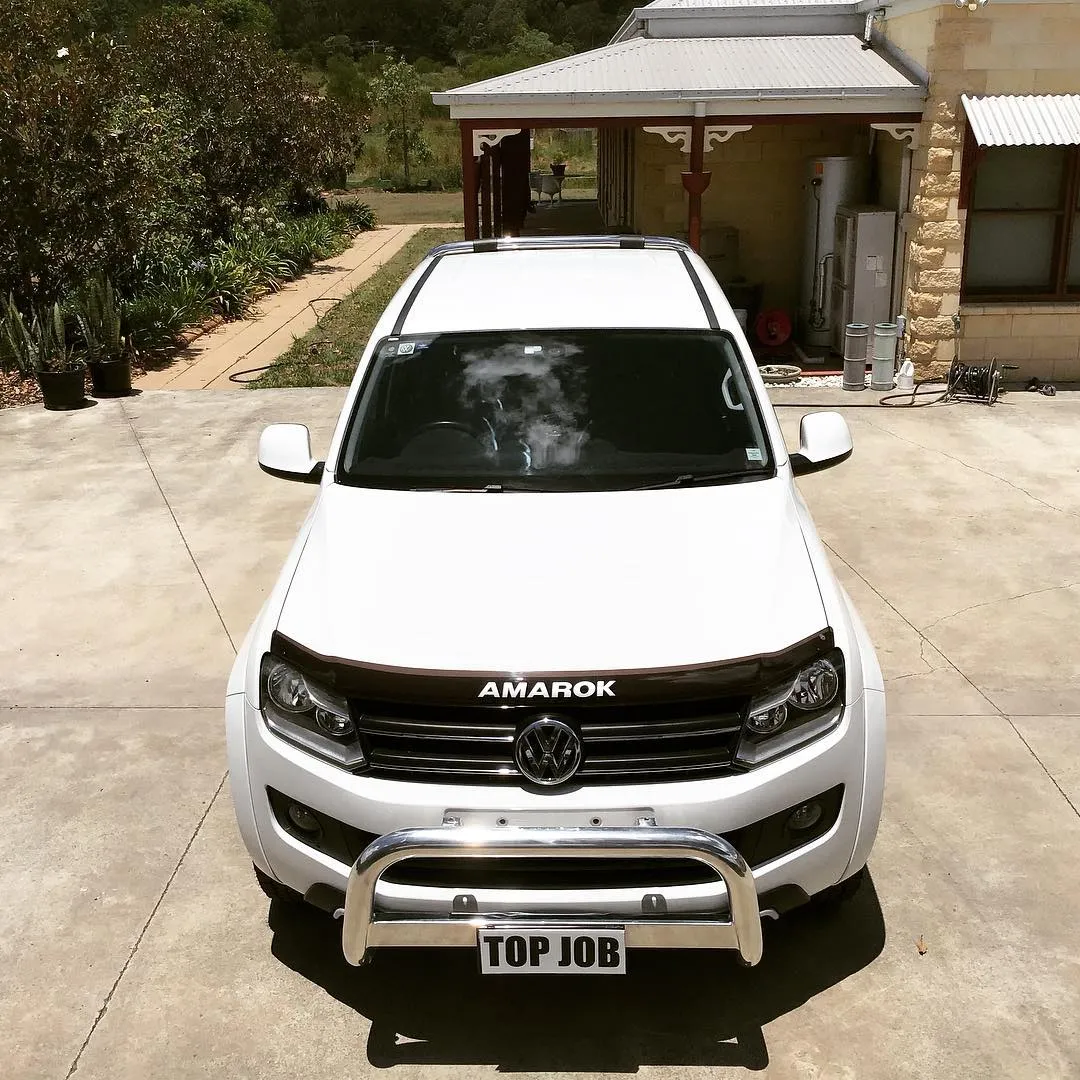White Volkswagen Amarok after a Silver package detail with Butter Wet Wax