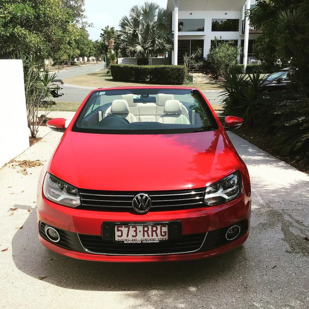 Red Volkswagen Eos convertible after a detail